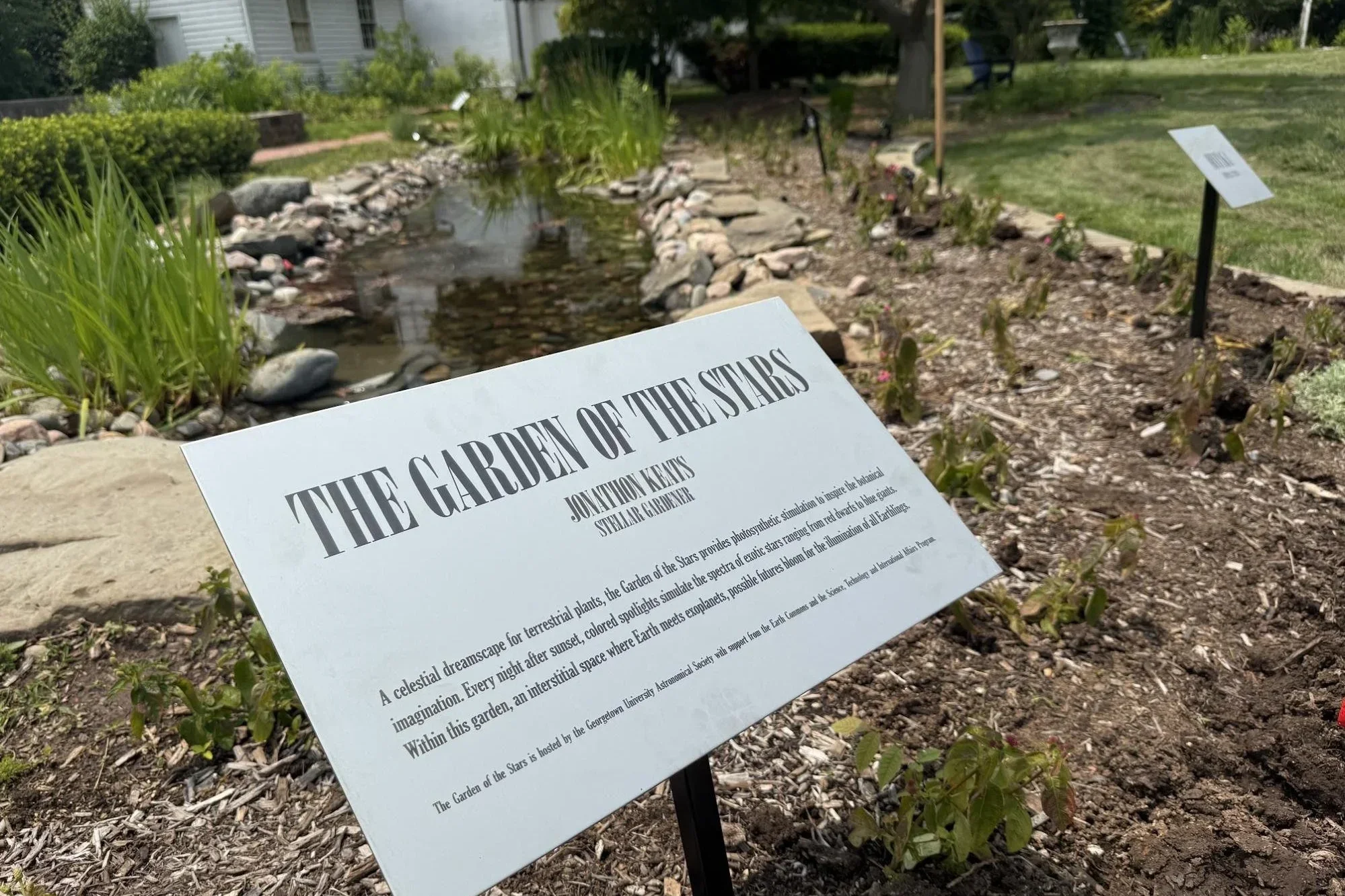 An up close photo of the The Garden of the Stars sign at the Heyden Observatory